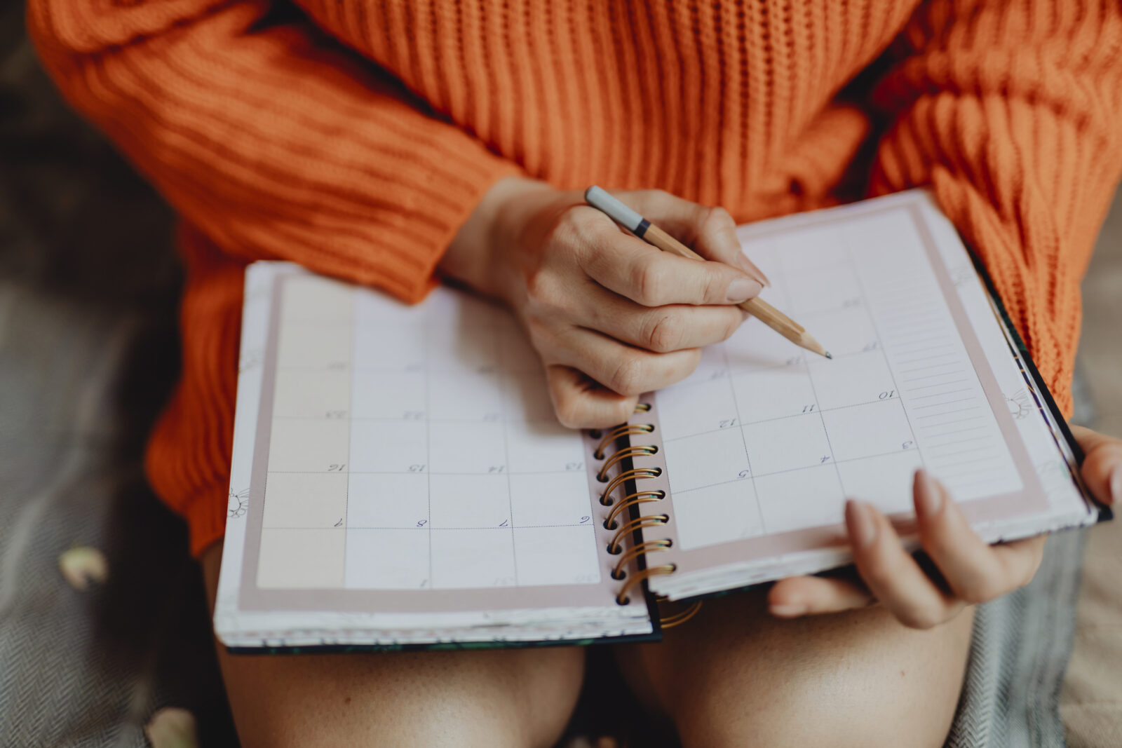 woman looking a schedule