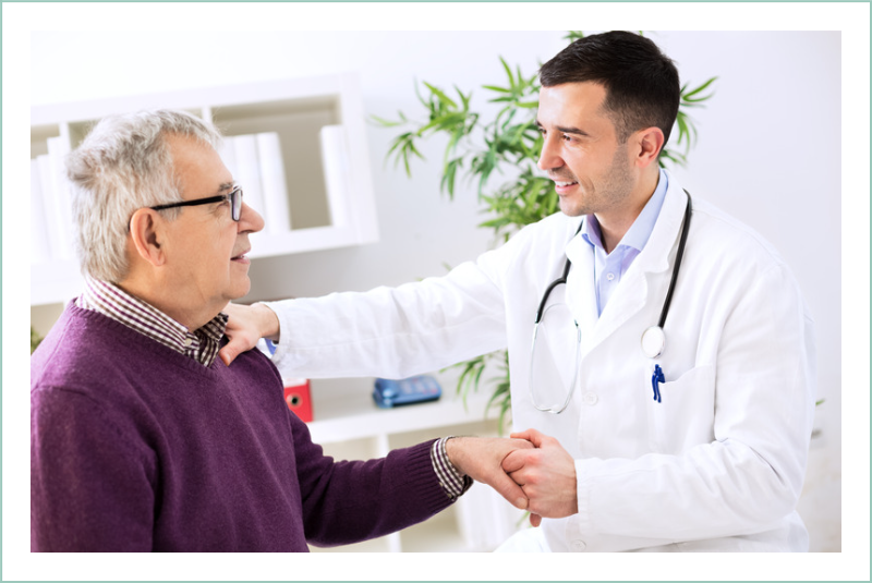 Doctor shaking hands with patient